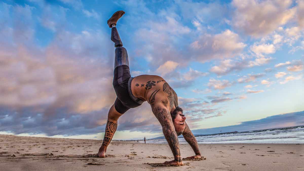 Steven Young yoga on the beach at sundown