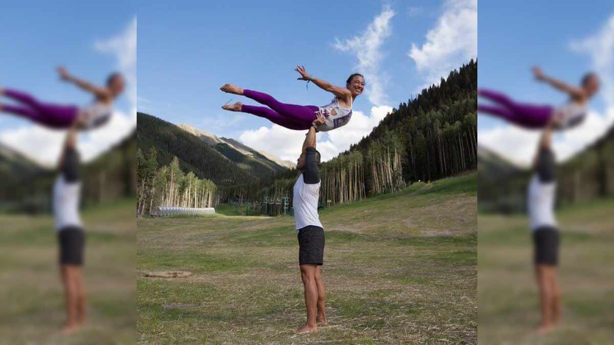 Taos Mountain Yoga Festival Couple doing acro yoga